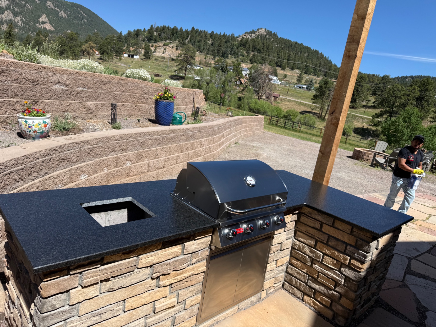 Our crew installing an outdoor granite kitchen in the Colorado foothills